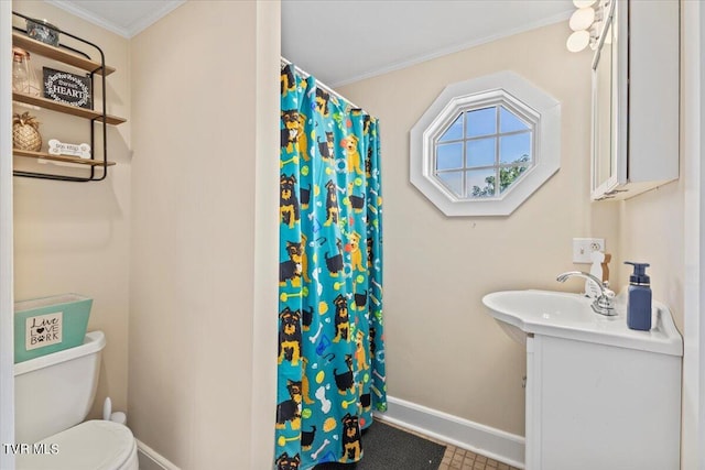 bathroom featuring vanity, crown molding, toilet, and a shower with shower curtain