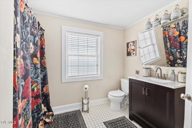 bathroom featuring crown molding, vanity, and toilet