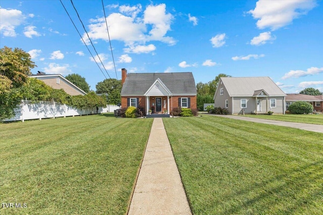 view of front of house with a front lawn and covered porch