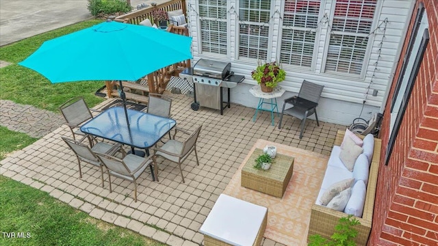 view of patio featuring an outdoor living space and a grill