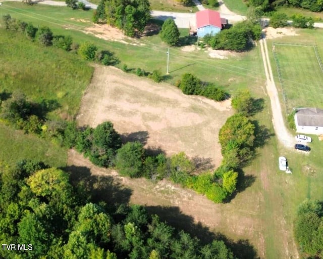 birds eye view of property featuring a rural view