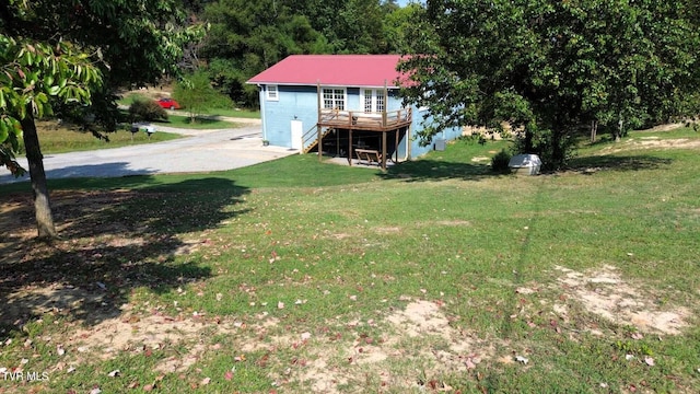 view of yard featuring a deck