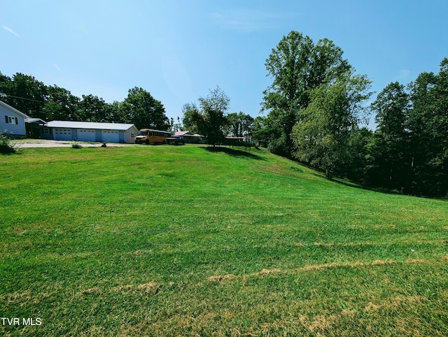 view of yard with a garage