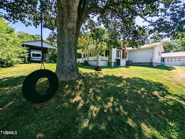 view of yard with a garage