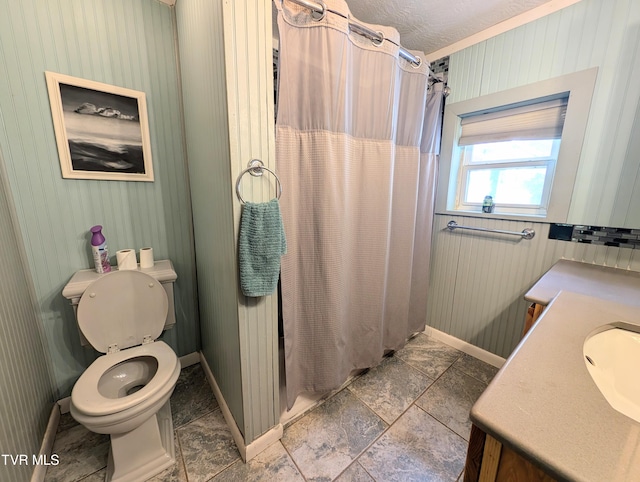 bathroom with vanity, toilet, and a shower with shower curtain