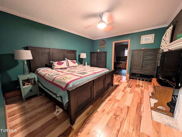 bedroom with ceiling fan, light wood-type flooring, and crown molding