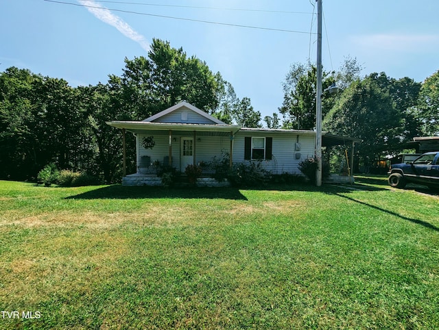 view of front of property featuring covered porch and a front yard