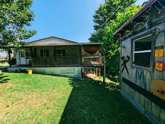 view of yard with a wooden deck