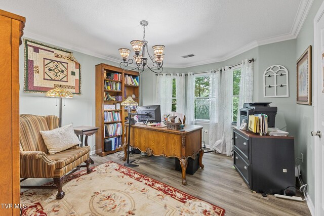 office space featuring hardwood / wood-style flooring, crown molding, a notable chandelier, and a textured ceiling