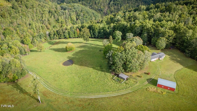 birds eye view of property featuring a rural view