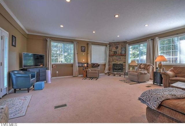 living room with crown molding, carpet, and a healthy amount of sunlight