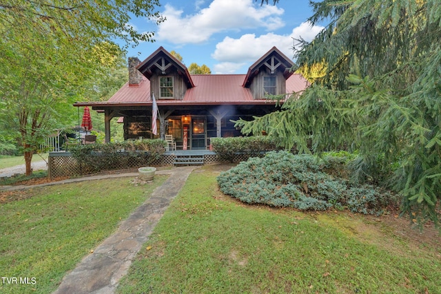 view of front of house with a front lawn and a porch