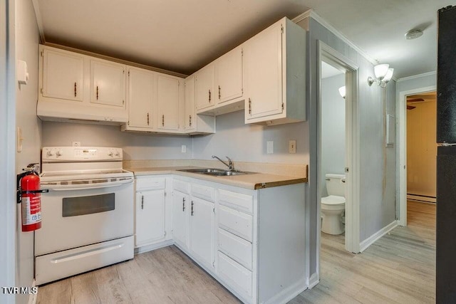 kitchen featuring a sink, white cabinetry, light wood-style floors, and white range with electric cooktop