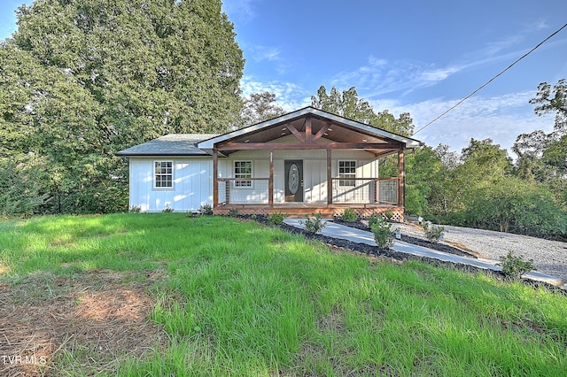 view of front of home featuring covered porch