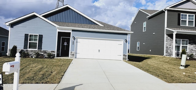 craftsman-style home with a garage and a front yard