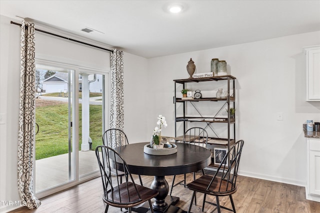 1720 Fox Meadows Cir, Bluff City, TN 37618 - dining area with light wood finished floors and baseboards