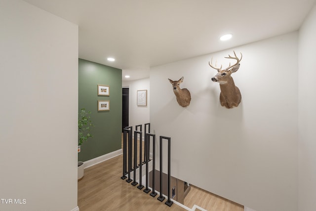 corridor featuring light hardwood / wood-style floors