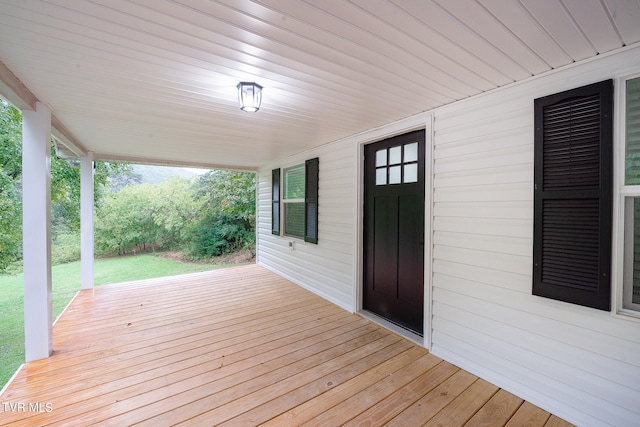 wooden deck with a porch