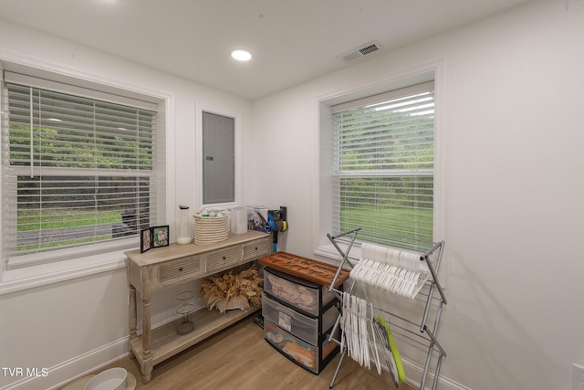 living area with hardwood / wood-style floors