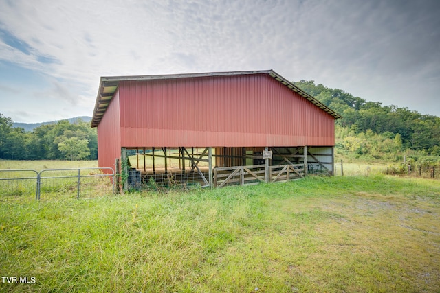 view of outdoor structure featuring a rural view