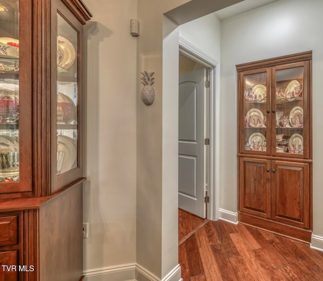 hall featuring dark hardwood / wood-style floors