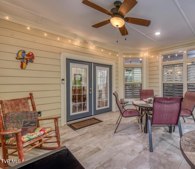 view of patio featuring ceiling fan