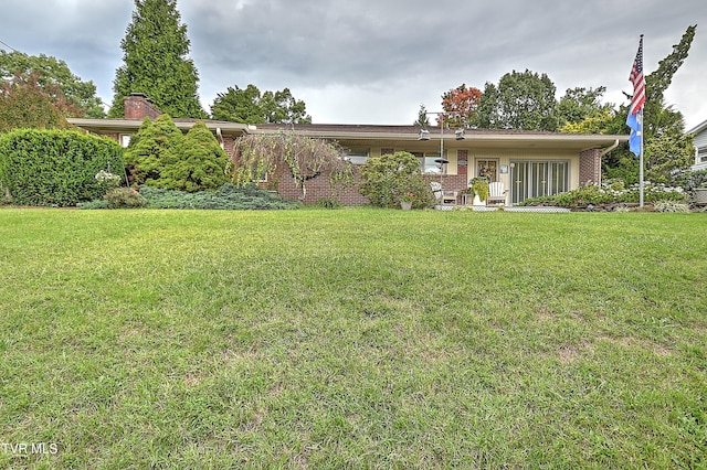 exterior space with a front yard