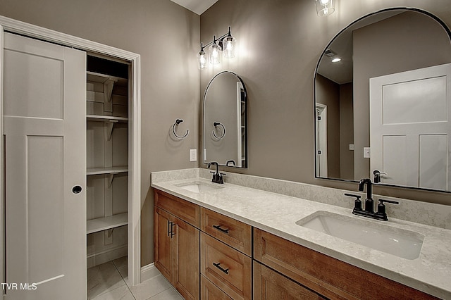 bathroom featuring vanity and tile patterned floors