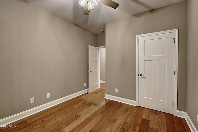 unfurnished bedroom with light hardwood / wood-style flooring and ceiling fan