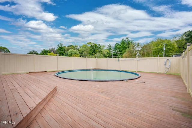 view of pool with a deck