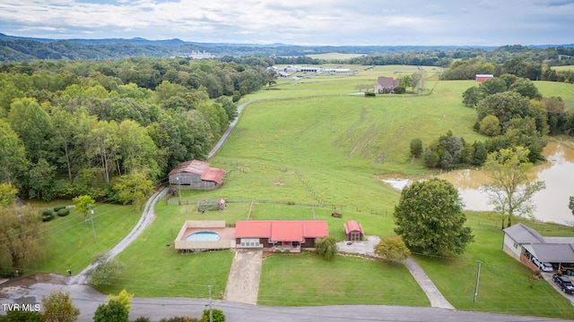 bird's eye view featuring a water view and a rural view