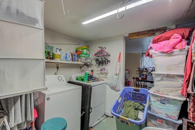 washroom with laundry area, tile patterned floors, and washer and clothes dryer