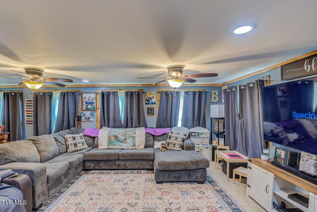 living area featuring ceiling fan