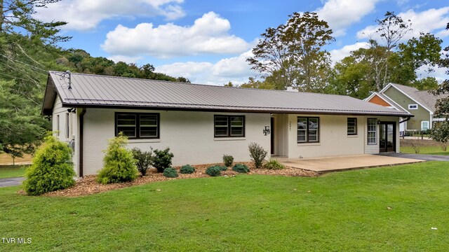 exterior space with a front lawn