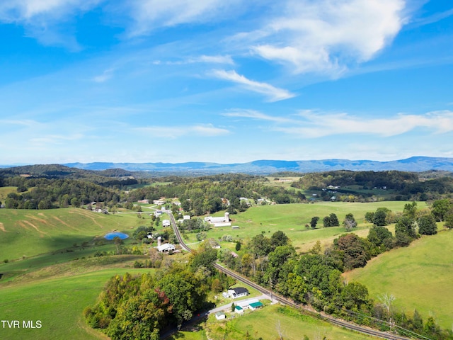 bird's eye view with a rural view and a mountain view