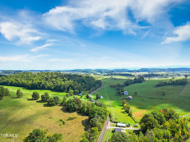 birds eye view of property with a rural view