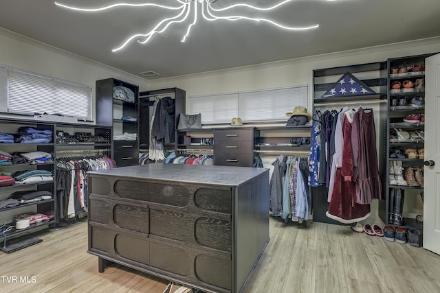 walk in closet with visible vents and light wood-style flooring