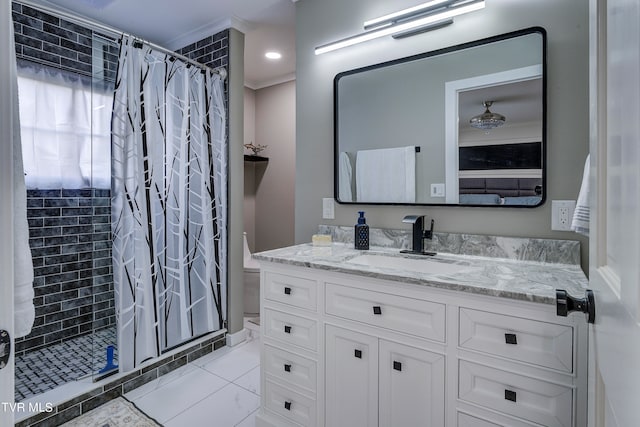 bathroom with walk in shower and vanity