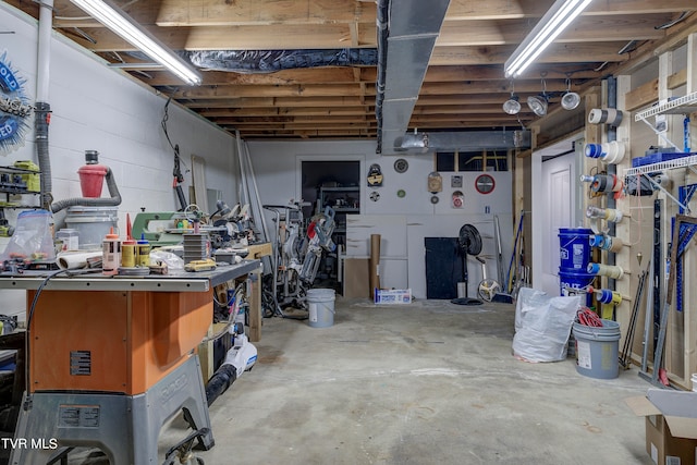 basement featuring a workshop area