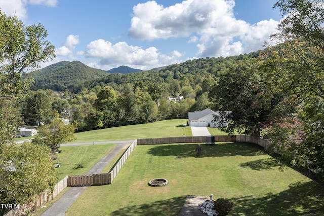 view of mountain feature featuring a rural view and a forest view