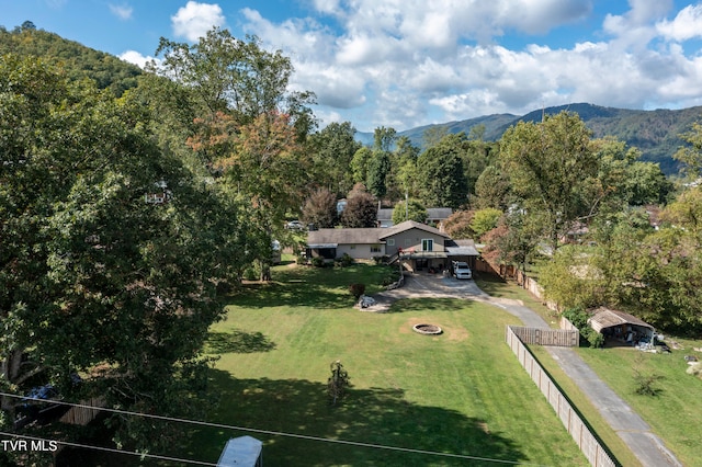 birds eye view of property featuring a mountain view