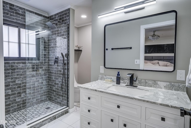 full bathroom featuring vanity, tile patterned floors, and a stall shower