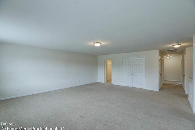 empty room with light carpet