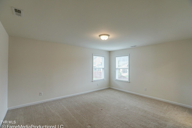 view of carpeted spare room