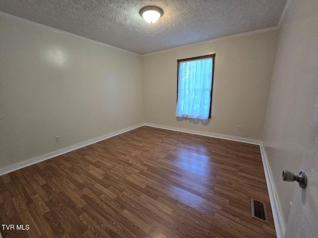 unfurnished room featuring ornamental molding, a textured ceiling, and dark hardwood / wood-style floors