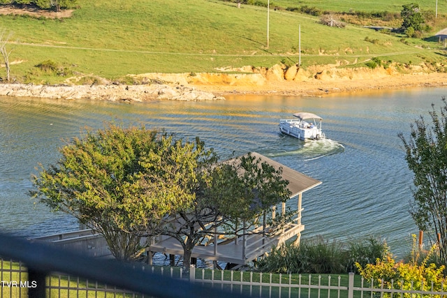 aerial view featuring a rural view and a water view