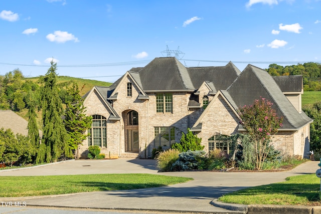 view of french country inspired facade