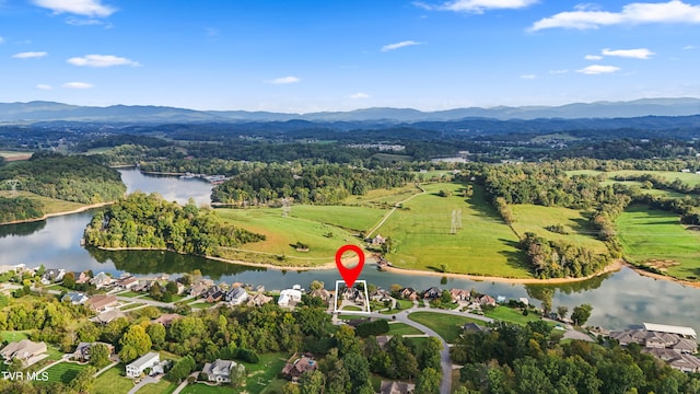 bird's eye view featuring a water and mountain view