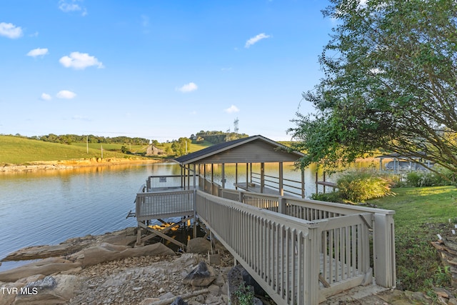 dock area with a water view