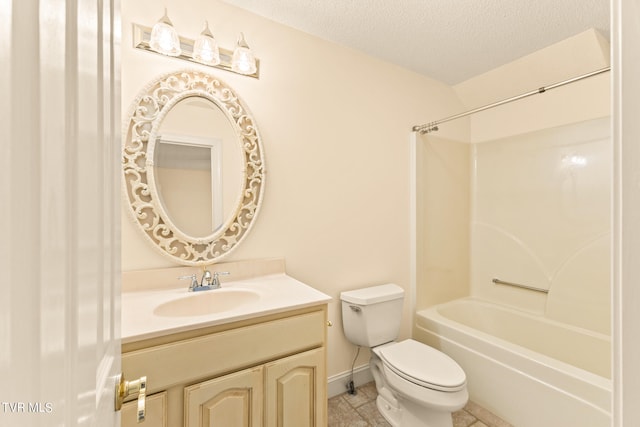 full bathroom featuring shower / bathing tub combination, vanity, toilet, and a textured ceiling